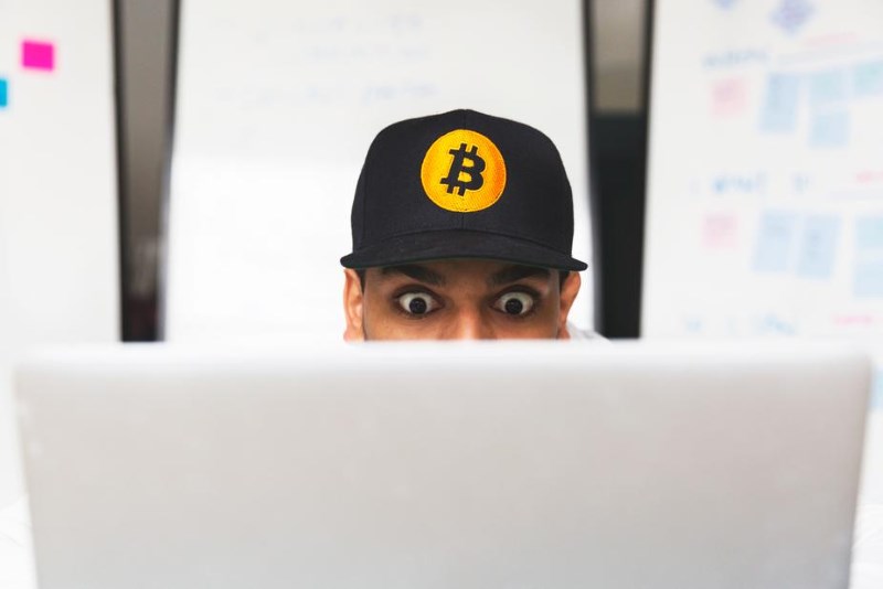 1 shocked bitcoin investor on laptop