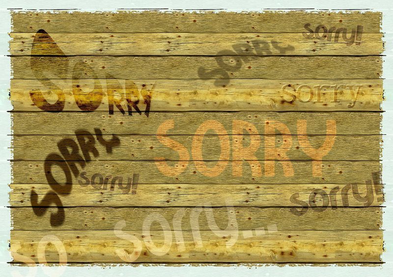 Several Sorry Text on Wooden Board